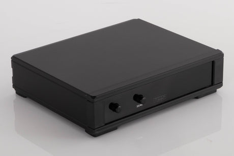 Front left corner of a used Rega NEO Turntable Power Supply in a Black finish