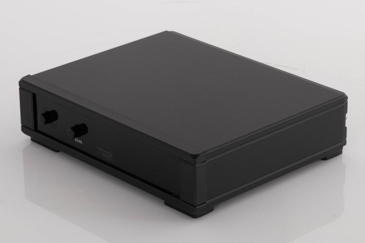 Front right corner of a used Rega NEO Turntable Power Supply in a Black finish