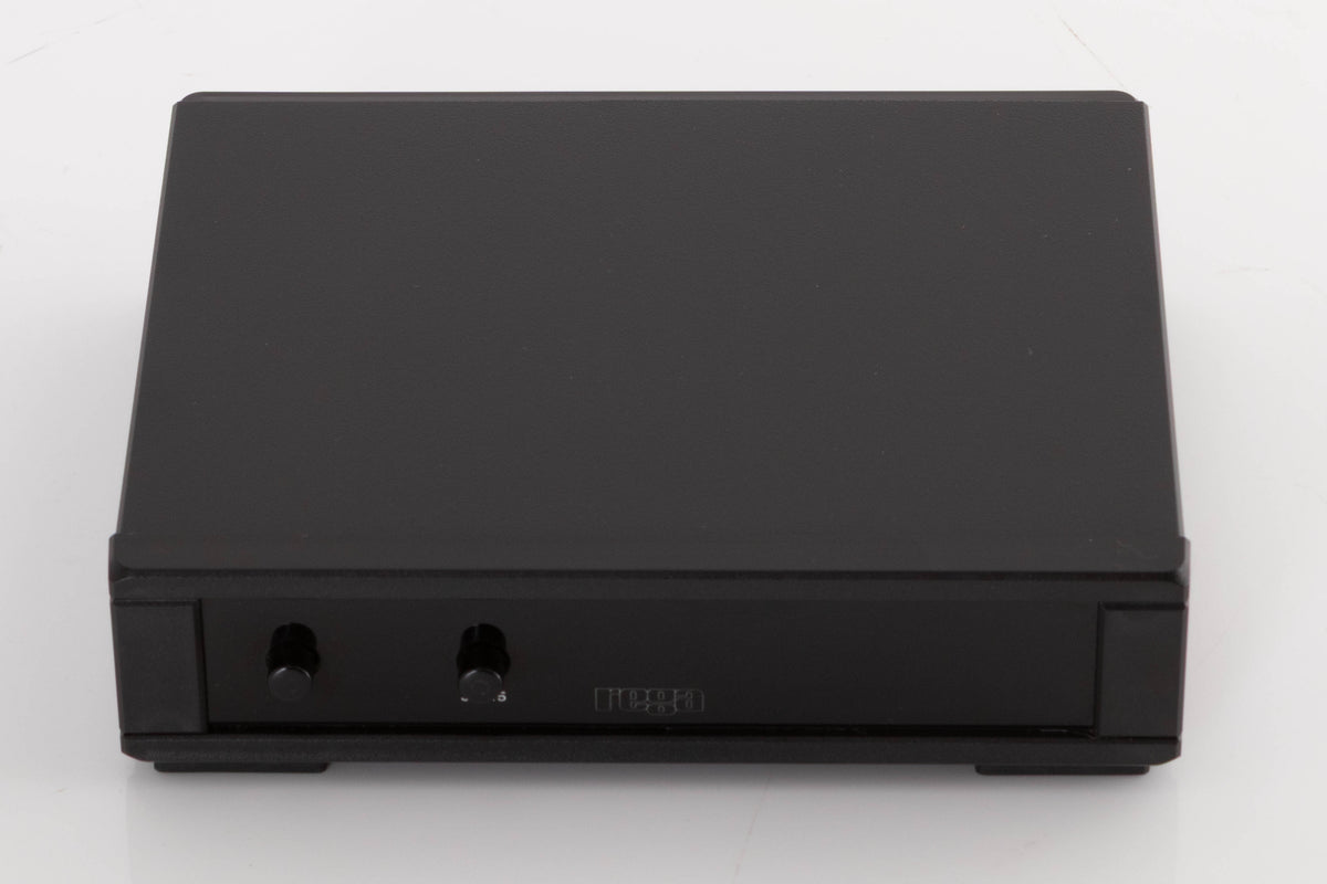 Top of a used Rega NEO Turntable Power Supply in a Black finish