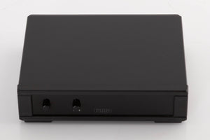 Top of a used Rega NEO Turntable Power Supply in a Black finish