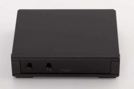 Top of a used Rega NEO Turntable Power Supply in a Black finish