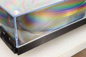 Close up view of a used Rega Planar 1 ECO Turntable in Black Gloss finish showing some scratching on the lid on the left side