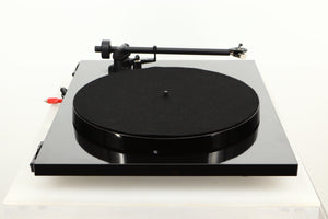 Side view of a used Rega Planar 1 ECO Turntable in Black Gloss finish