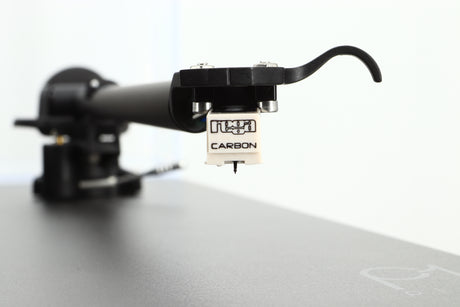 Close up view of a used Rega Planar 1 Plus Turntable in Matt Black showing the cartridge 