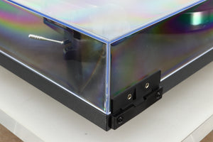 Rear left corner corner view of a used Rega Planar 1 Plus Turntable in Matt Black 