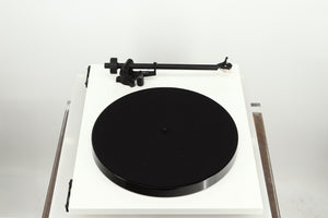 Left side view of a used Rega Planar 1 Plus Turntable in a white finish