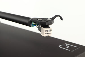 Close up of a used Rega Planar 1 Turntable in a matt black finish showing stylus