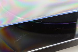 Close up of a used Rega Planar 1 Turntable in a matt black finish showing scratch on lid