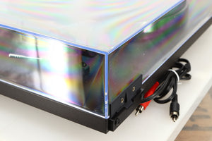 Rear right corner of a used Rega Planar 1 Turntable in a matt black finish