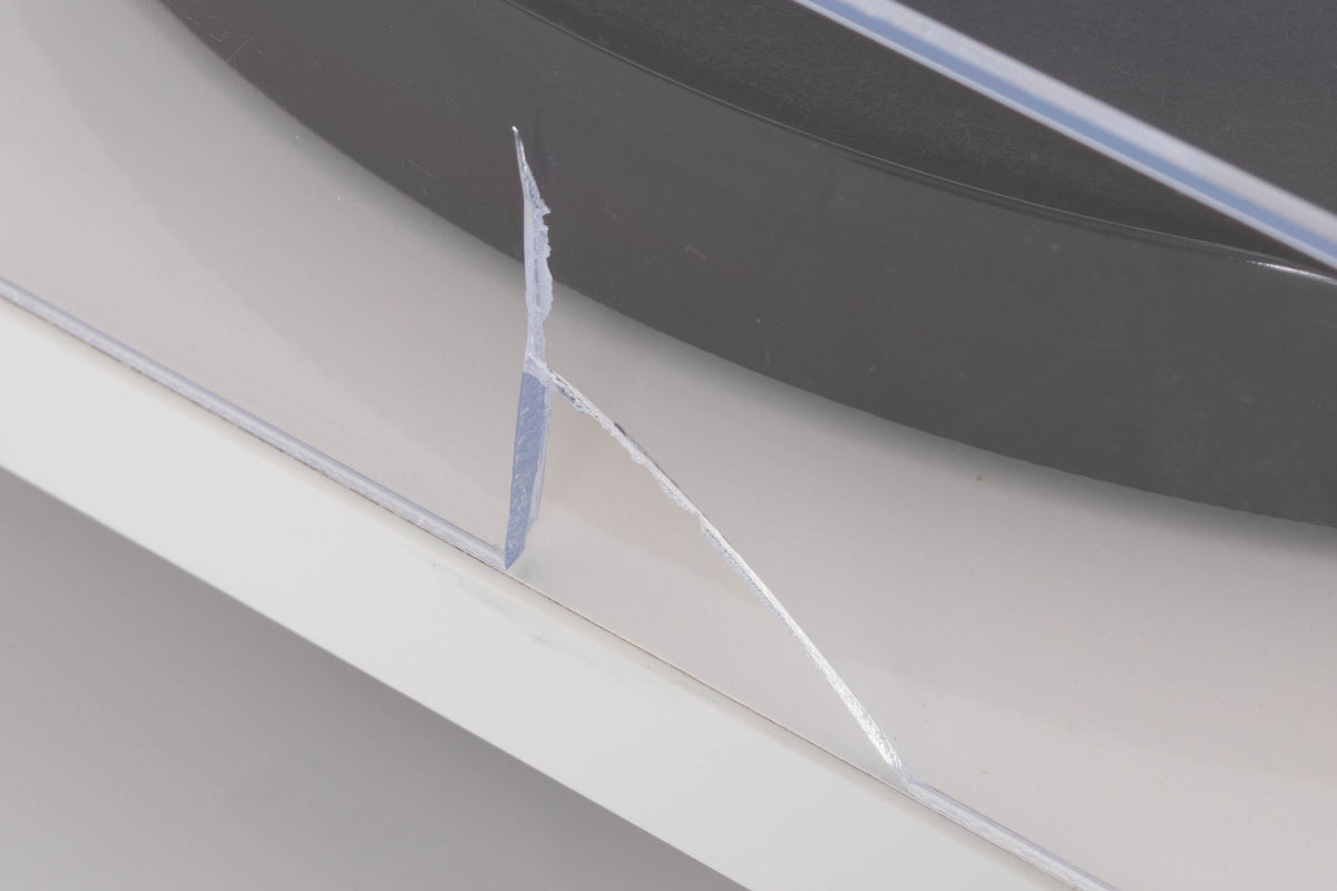 Close up of a used Rega Planar 1 Turntable in a White finish showing hole in lid