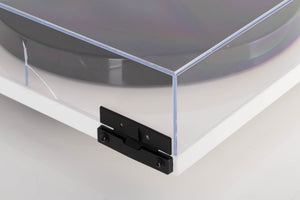 Rear left corner of a used Rega Planar 1 Turntable in a White finish