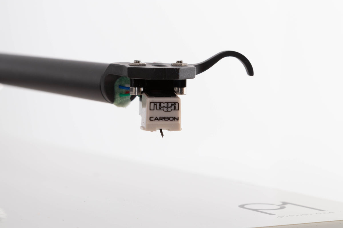 Close up of a used Rega Planar 1 Turntable in a White finish showing stylus