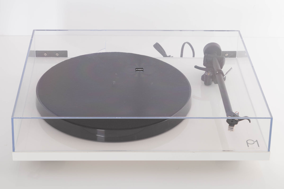 Top of a used Rega Planar 1 Turntable in a White finish showing lid