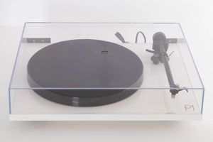 Top of a used Rega Planar 1 Turntable in a White finish showing lid