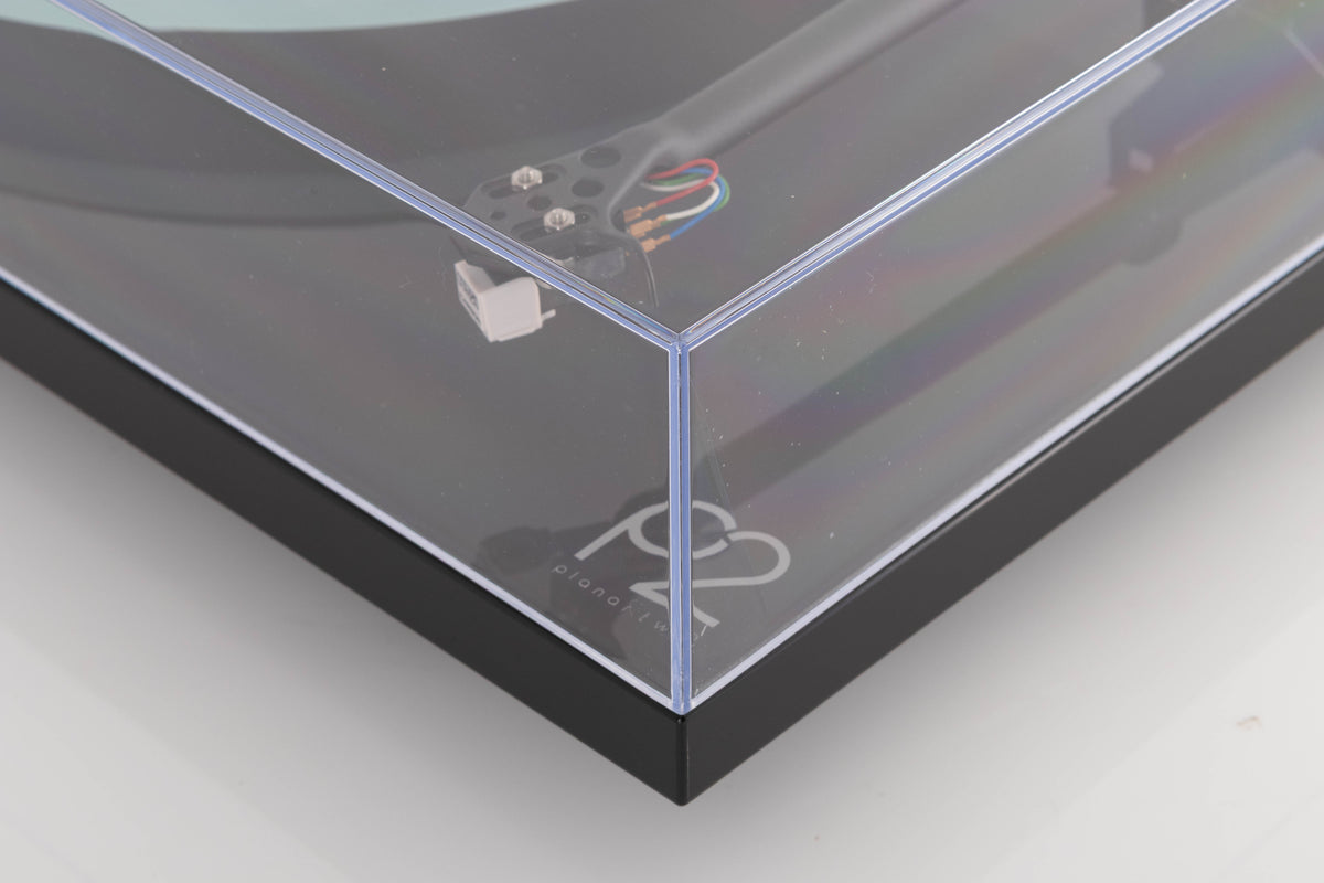 Front right corner of a used Rega Planar 2 Turntable in a Black finish