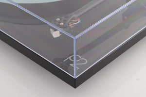 Front right corner of a used Rega Planar 2 Turntable in a Black finish