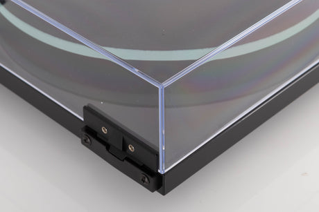 Rear left corner of a used Rega Planar 2 Turntable in a Black finish