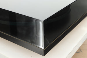 Front left corner of a used Rega Planar 2 Turntable / 24V Upgraded / Exact Cartridge in a black finish 