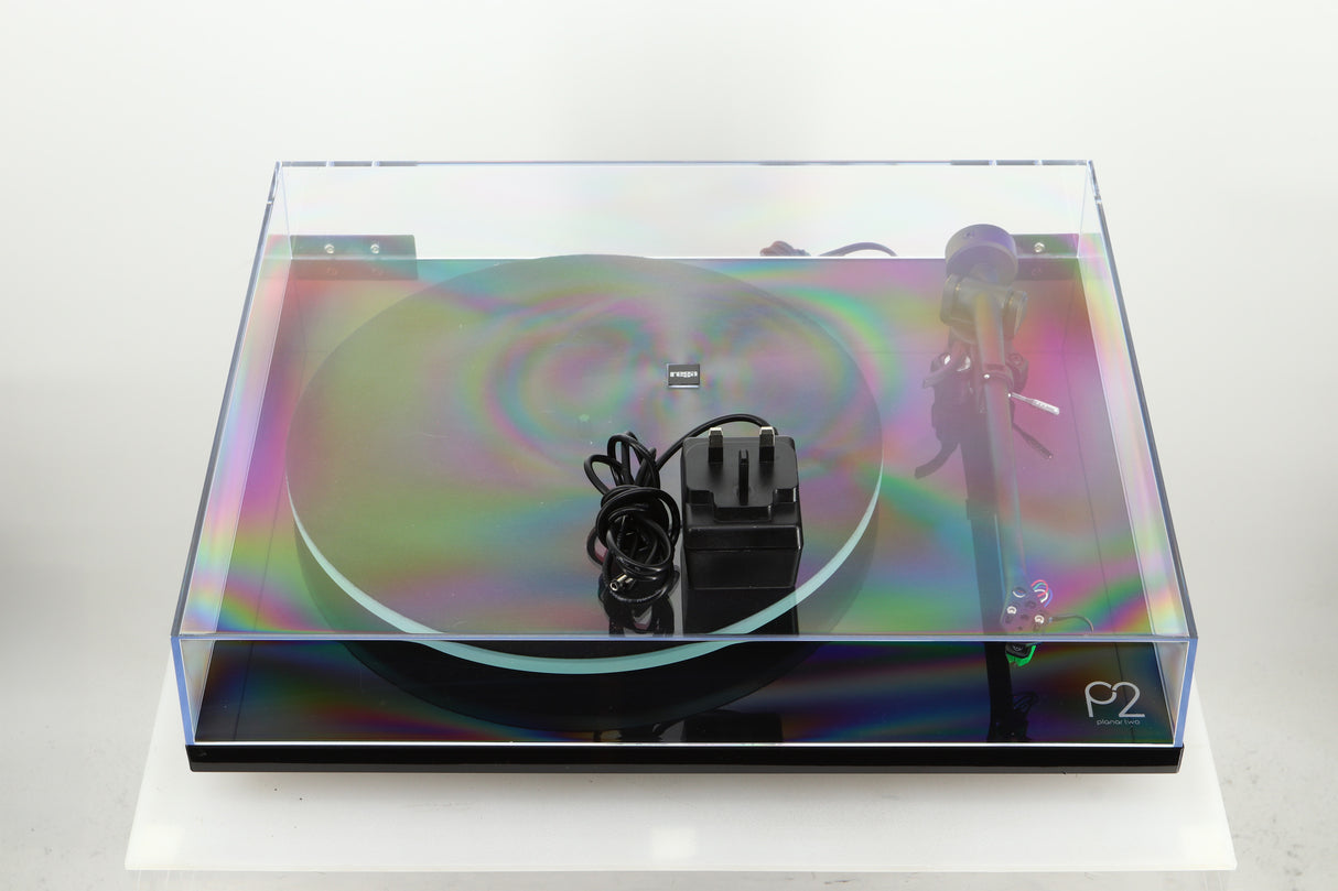 Top of a used Rega Planar 2 Turntable / AT-VM95E Cartridge in a black finish showing a power supply