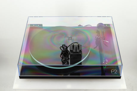 Top of a used Rega Planar 2 Turntable / AT-VM95E Cartridge in a black finish showing a power supply