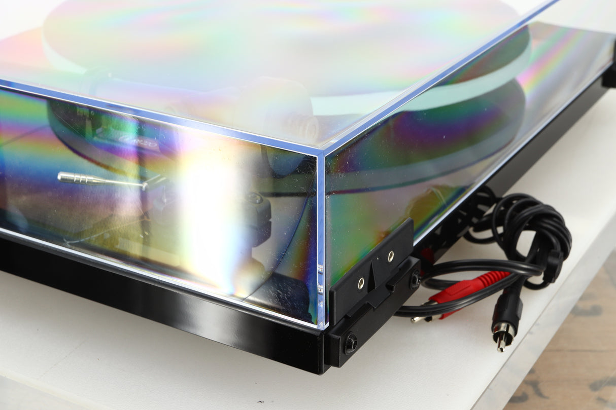 Rear right corner of a used Rega Planar 2 Turntable / AT-VM95E Cartridge in a black finish