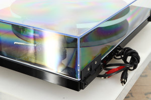 Rear right corner of a used Rega Planar 2 Turntable / AT-VM95E Cartridge in a black finish