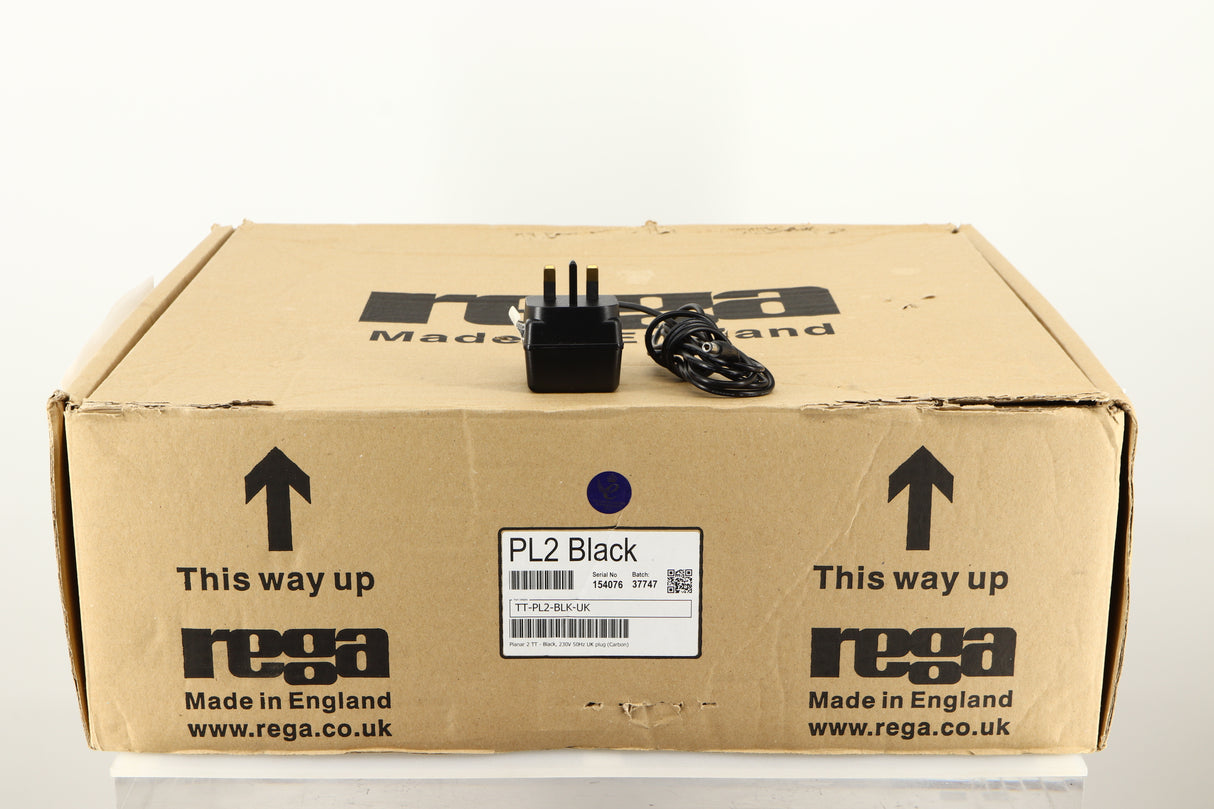 Box for a used Rega Planar 2 Turntable / AT-VM95EN Cartridge in a black finish showing PSU