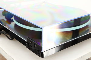 Rear left corner of a used Rega Planar 2 Turntable / AT-VM95EN Cartridge in a black finish