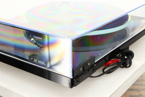 Rear right corner of a used Rega Planar 2 Turntable / AT-VM95EN Cartridge in a black finish