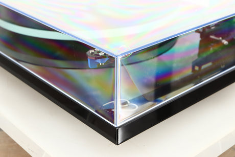 Front right corner of a used Rega Planar 2 / Elys 2 Cartridge in a black gloss finish