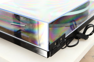 Rear right corner of a used Rega Planar 2 / Elys 2 Cartridge in a black gloss finish