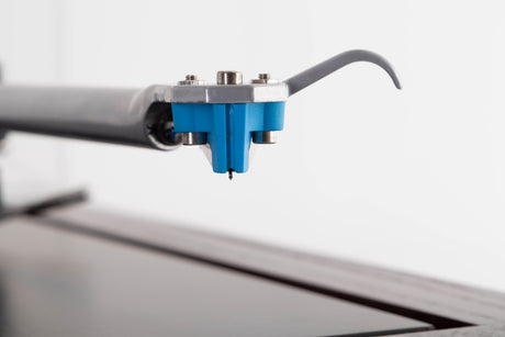 Close up view of a used Rega Planar 25 Turntable in Black with Elys Cartridge