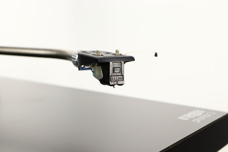 Close up of a used Rega Planar 3 (24V Motor Upgraded) Turntable / Grado F3+ Cartridge in a black finish showing stylus