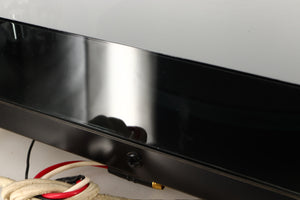 Close up of a used Rega Planar 3 (24V Motor Upgraded) Turntable / Grado F3+ Cartridge in a black finish showing scratching on lid