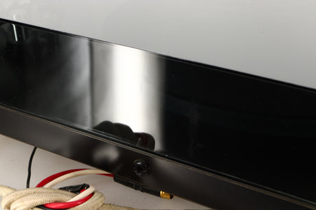 Close up of a used Rega Planar 3 (24V Motor Upgraded) Turntable / Grado F3+ Cartridge in a black finish showing scratching on lid