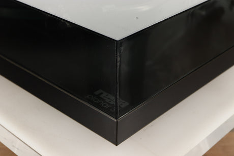 Front right corner of a used Rega Planar 3 (24V Motor Upgraded) Turntable / Grado F3+ Cartridge in a black finish