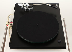 Left side view of a used Rega Planar 3 (24V Motor Upgraded) Turntable / Grado F3+ Cartridge in a black finish