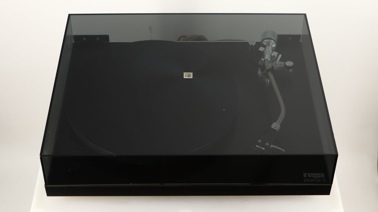 Front view of a used Rega Planar 3 (24V Motor Upgraded) Turntable / Grado F3+ Cartridge in a black finish showing lid