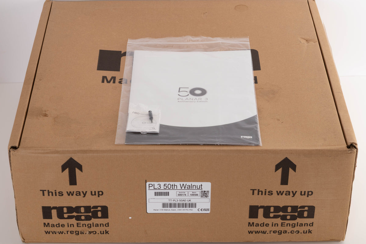 Box for a used Rega Planar 3 50th Anniversary Turntable in a Walnut finish showing Manual and Speed Adjustment Tool