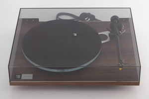 Top of a used Rega Planar 3 50th Anniversary Turntable in a Walnut finish showing lid