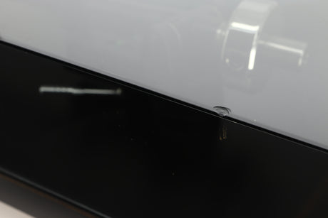 Close up of a used Rega Planar 3 (24V Upgraded) Turntable / Goldring E3 Cartridge in a black finish showing small chip on right side edge of the lid