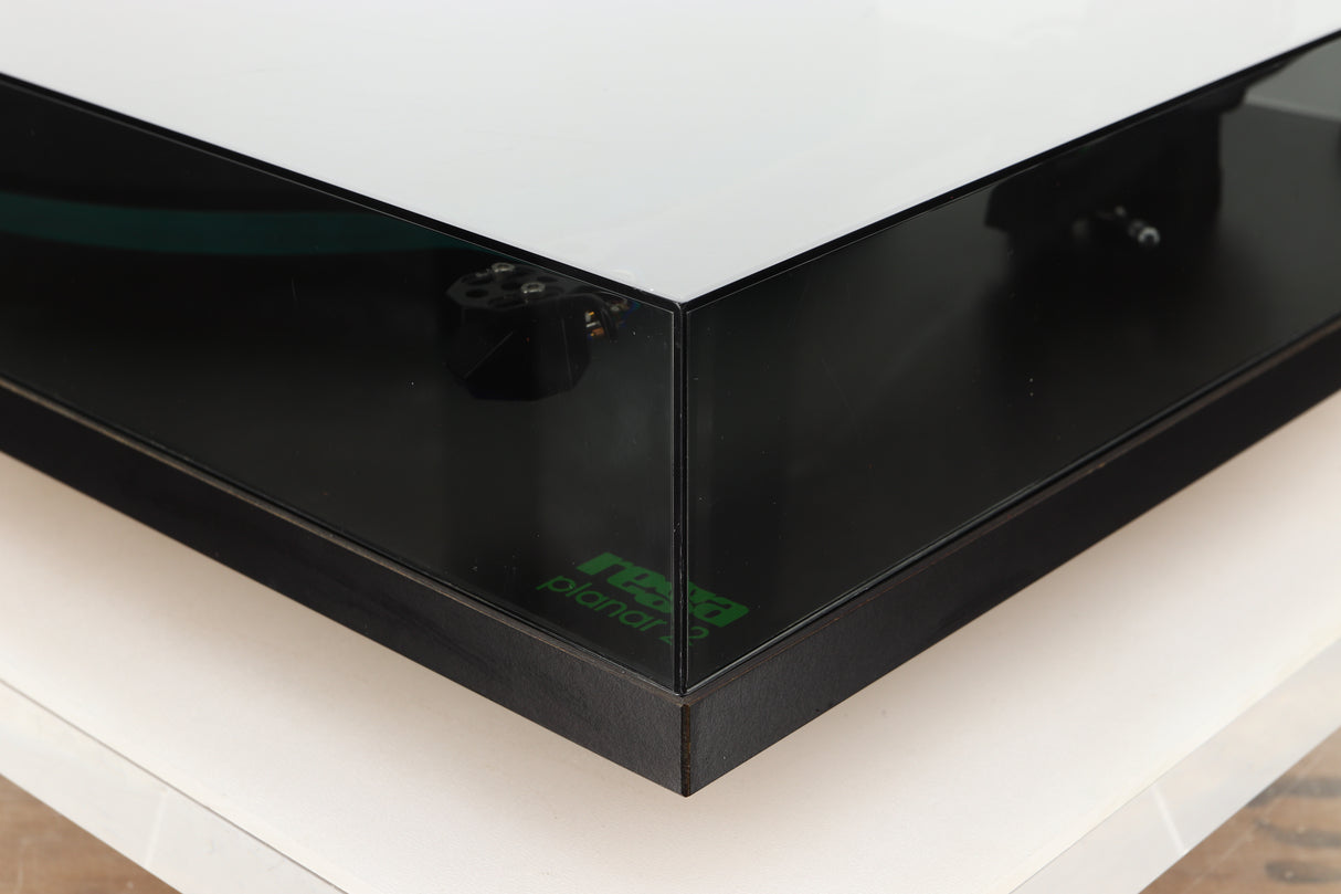 Front right corner of a used Rega Planar 3 (24V Upgraded) Turntable / Goldring E3 Cartridge in a black finish