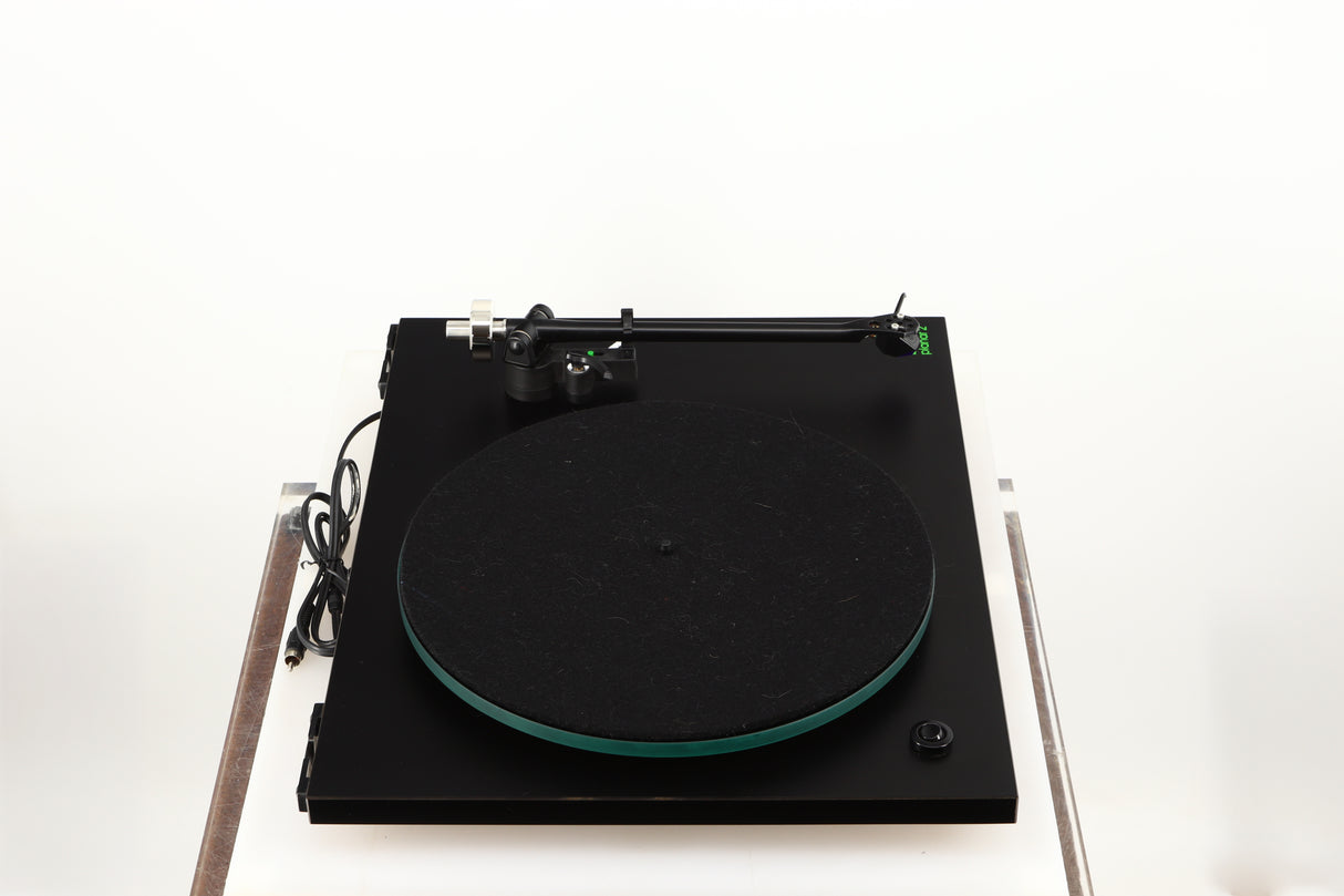 Left side view of a used Rega Planar 3 (24V Upgraded) Turntable / Goldring E3 Cartridge in a black finish