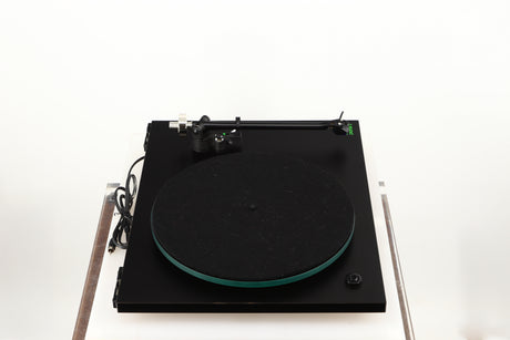 Left side view of a used Rega Planar 3 (24V Upgraded) Turntable / Goldring E3 Cartridge in a black finish