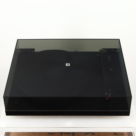 Top of a used Rega Planar 3 Turntable 24V Upgraded in a black finish