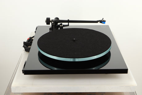 Side view of a used Rega Planar 3 Turntable in Black finish with an Elys Cartridge