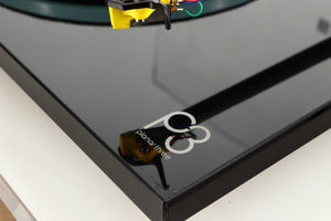 Close up of a used Rega Planar 3 Turntable / Elys Cartridge in a black finish showing some marks on unit