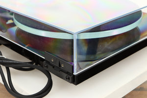 Rear left corner of a used Rega Planar 3 Turntable / Elys Cartridge in a black finish