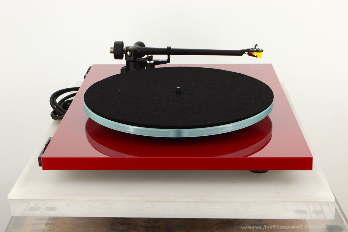 Side view of a used Rega Planar 3 Turntable in Red finish with Exact Cartridge