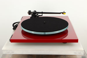 Side view of a used Rega Planar 3 Turntable in Red finish with Exact Cartridge